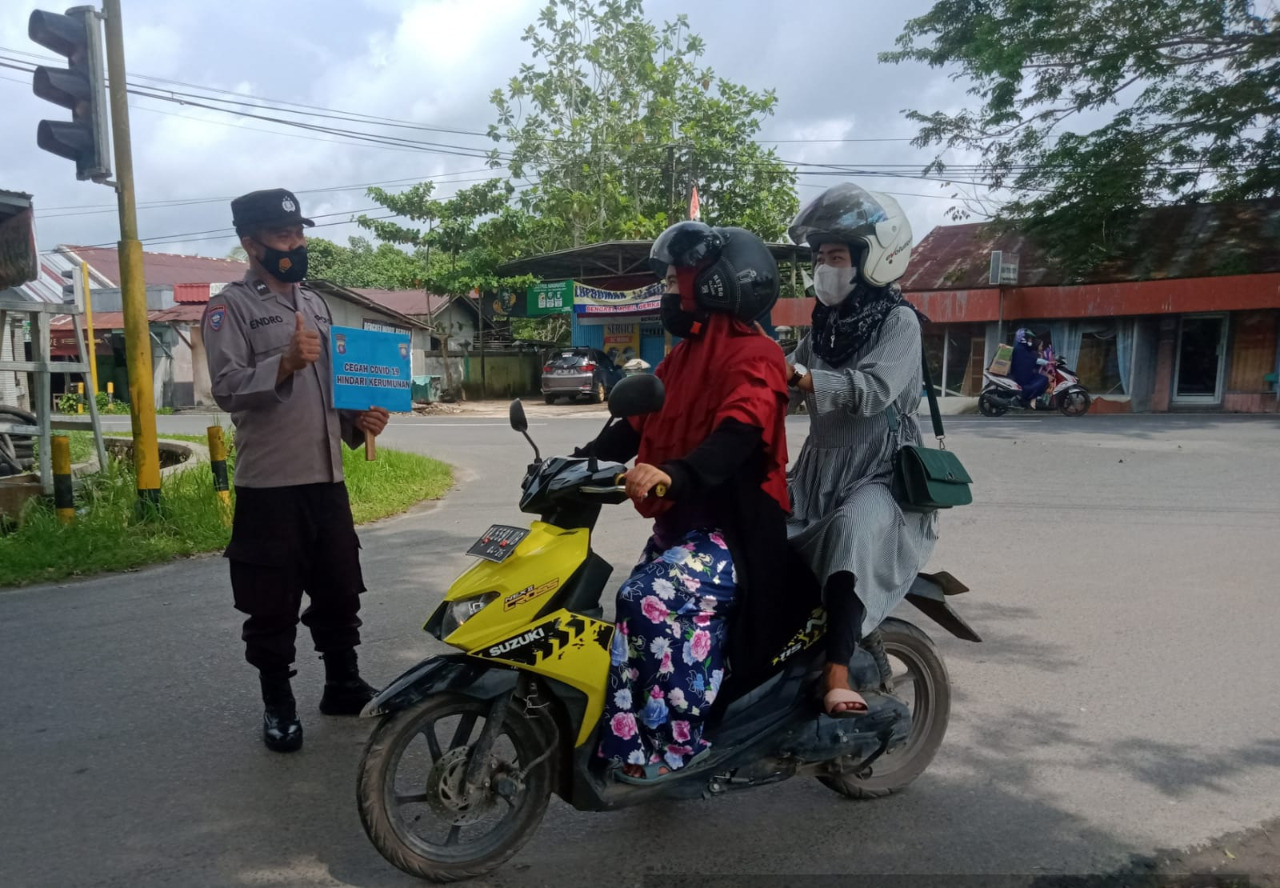 Tingkatkan kepatuhan PROKES, Sat Binmas Polres Pulang Pisau Sambang dan Sosialisasi