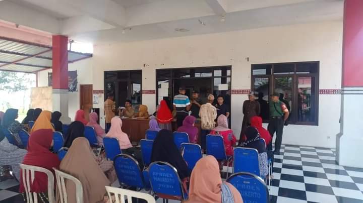 Pendistribusian Bantuan Pangan Kepada Warga