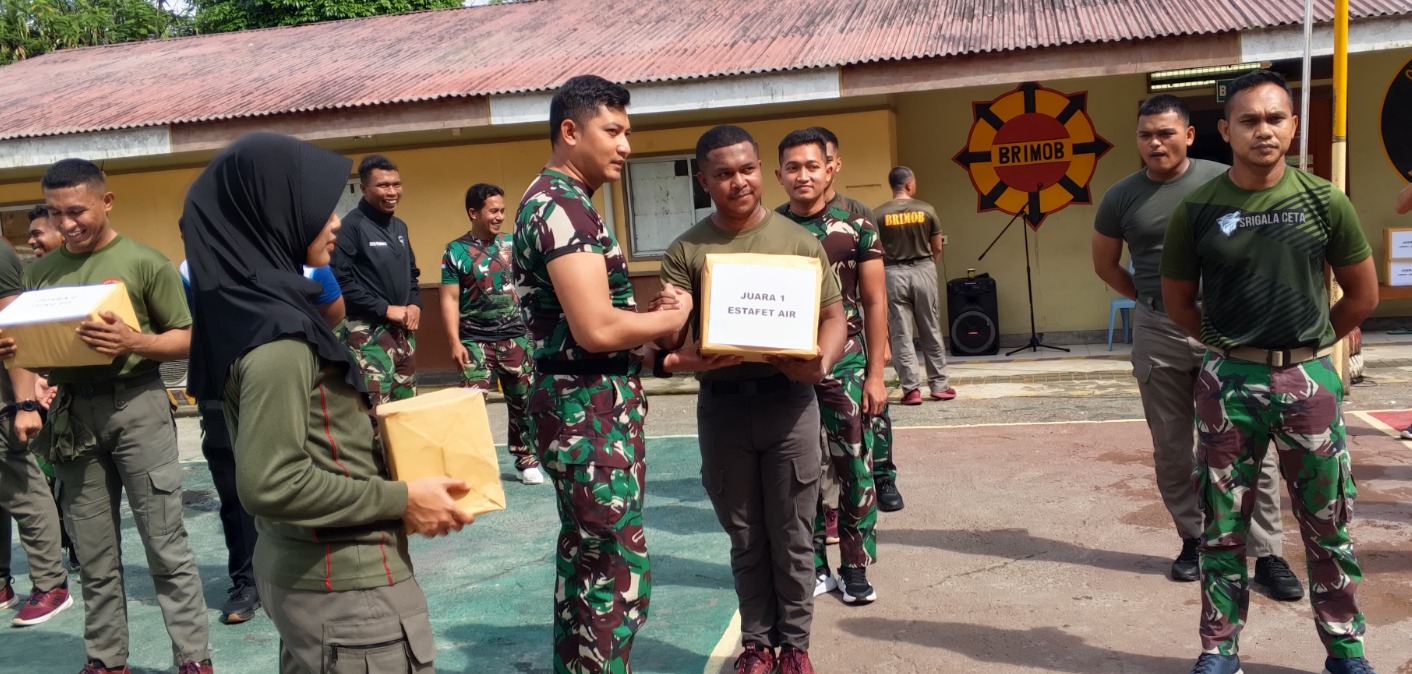 Tingkatkan Sinergitas, Satgas Yonif 611/Awang Long Bersama Satgas Pam Obyek Amole I Gelar Lomba Gembira