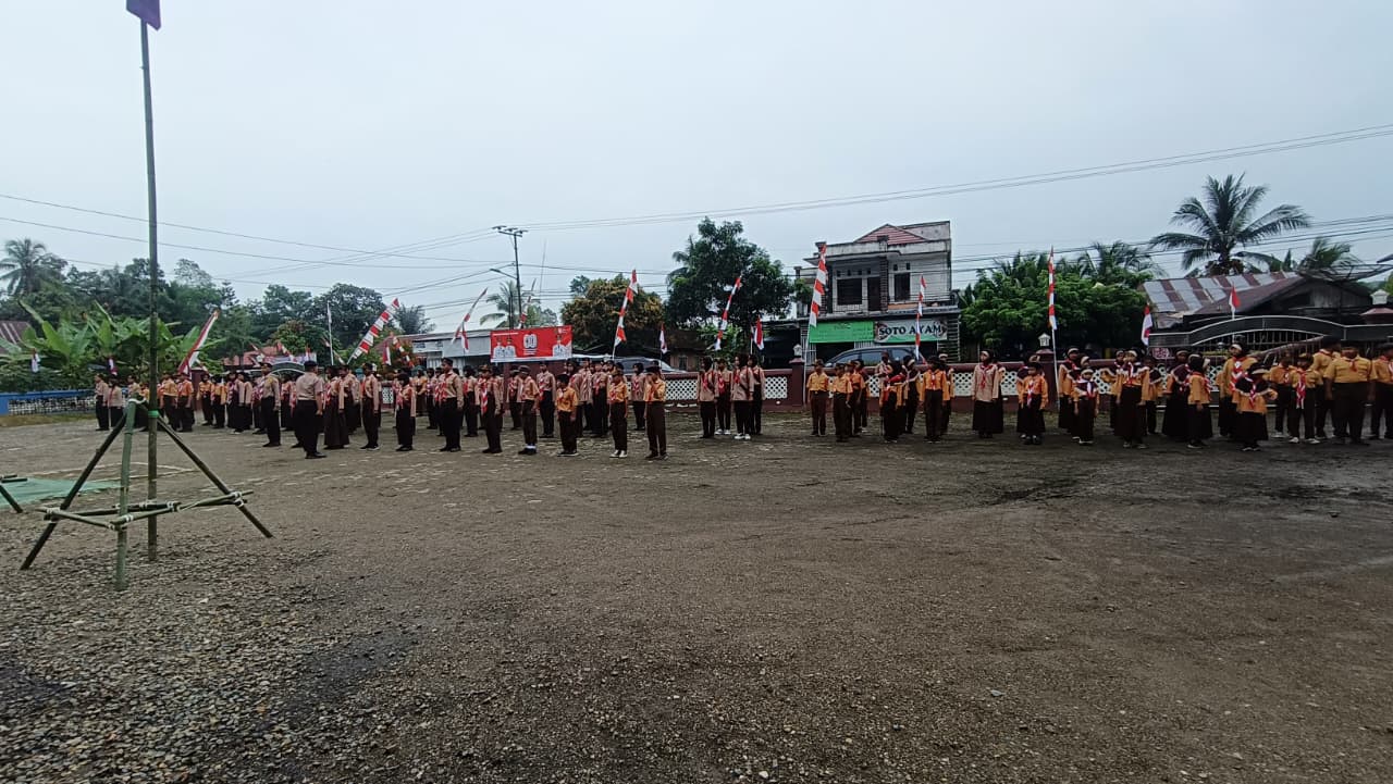 Serma Pranoto Hadiri Upacara Hari Pramuka ke-65 di Kecamatan Haruai