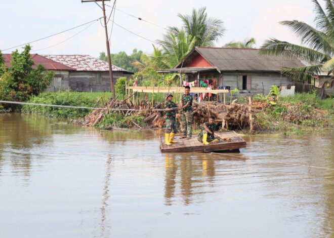 Memanfaatkan Rakit Sederhana Personel Kodim 1009/Tla Tetap Semangat Angkut Material Jembatan Garuda