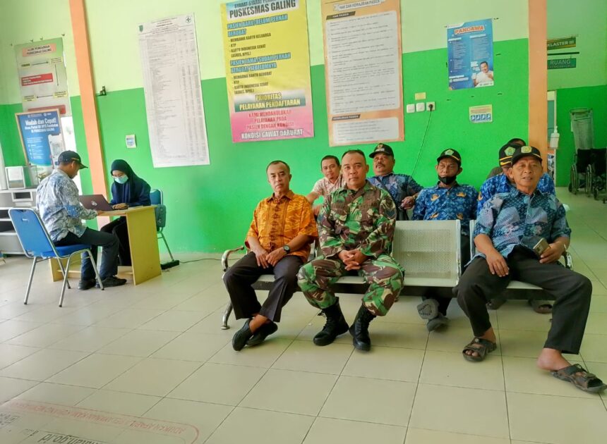 Anggota Koramil 07/Teluk Keramat Hadiri Launching Cek Kesehatan Gratis di Puskesmas Wilayah Binaan